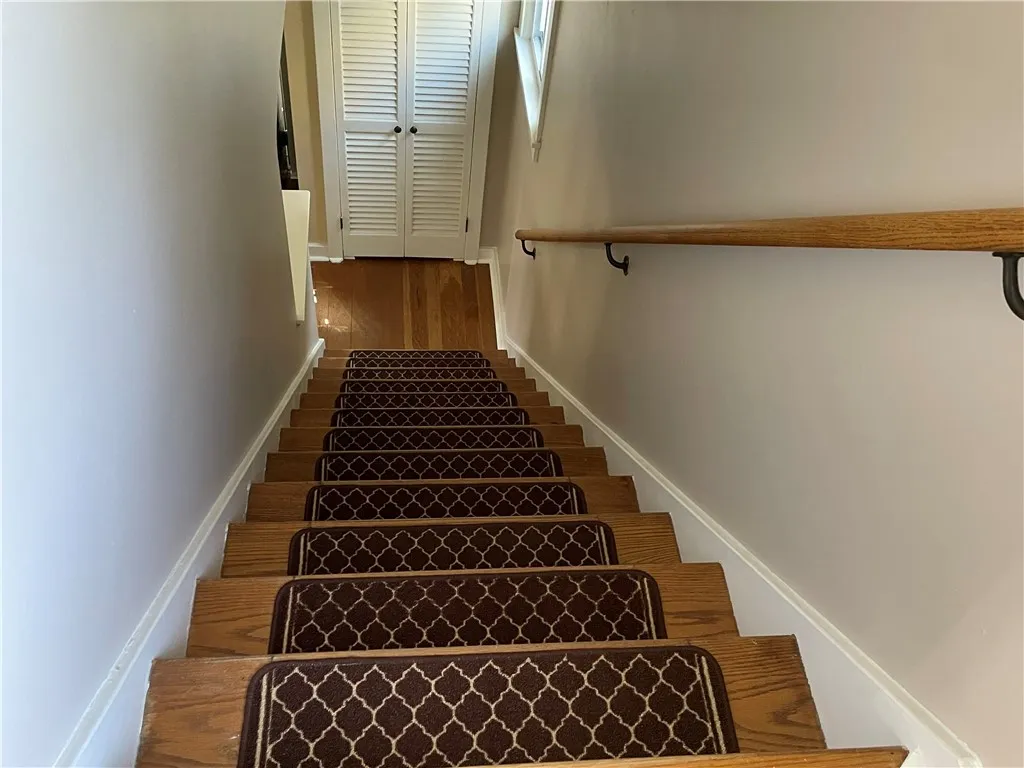 A view of the staircase to the upstairs.