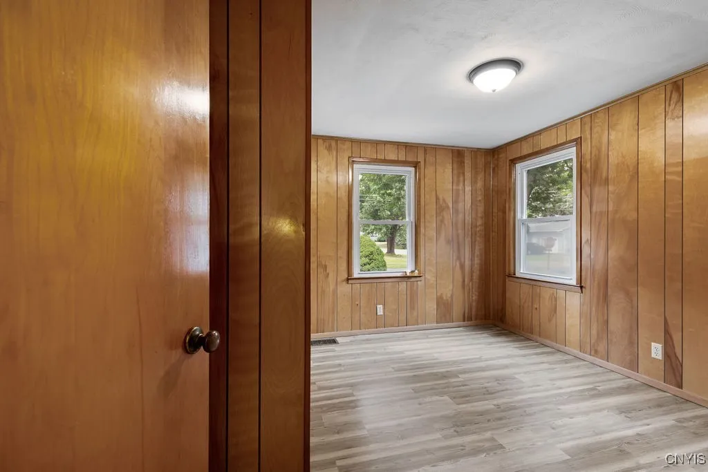 This is the front left bedroom on the first floor.  It has new luxury vinyl flooring and a new light fixture.