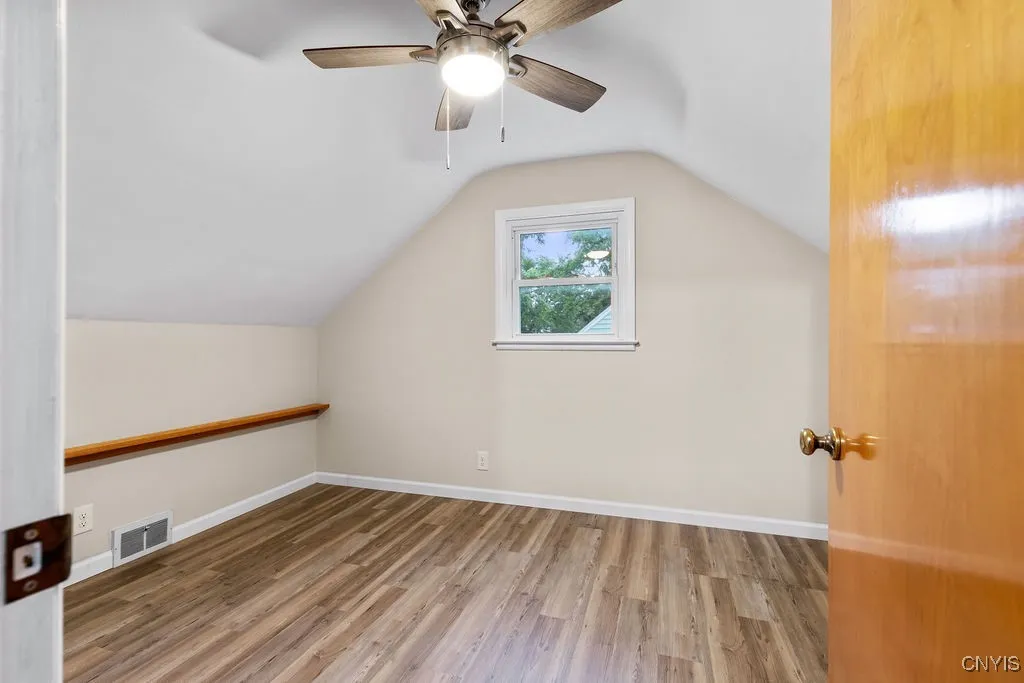 Another view of the upstairs, left side bedroom.