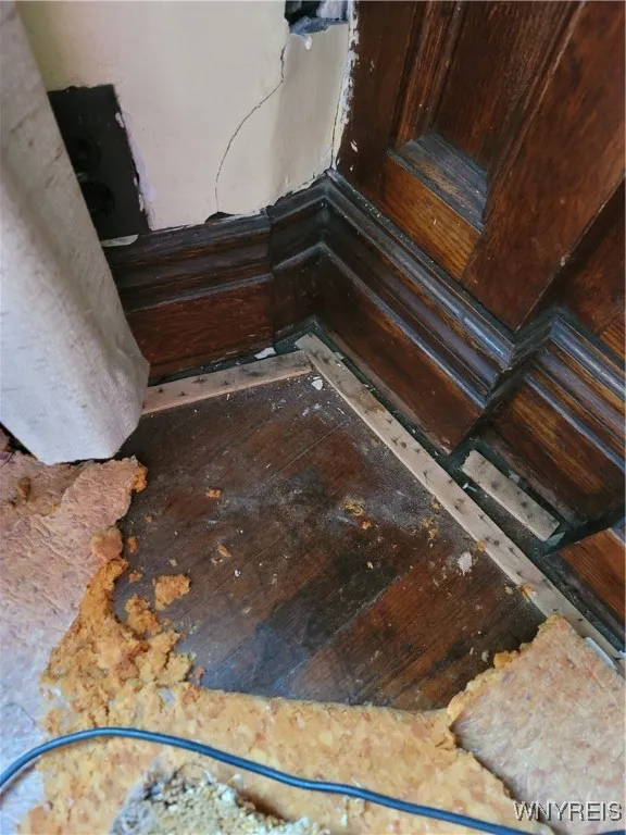 Hardwood floors under carpet in lower unit
