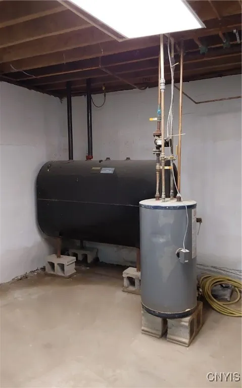 Oil tank and electric hot water heater