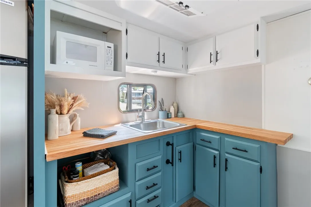 REAL BUTCHER BLOCK counters and plenty of storage space!