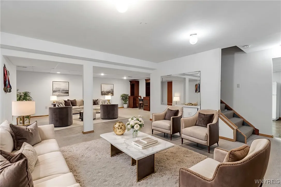 Lower Level is staged with furnishings for visual perspective only