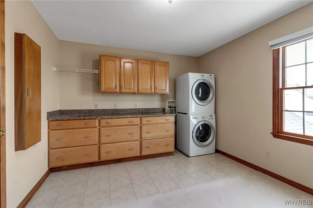xtra large 2nd floor laundry off the primary suite