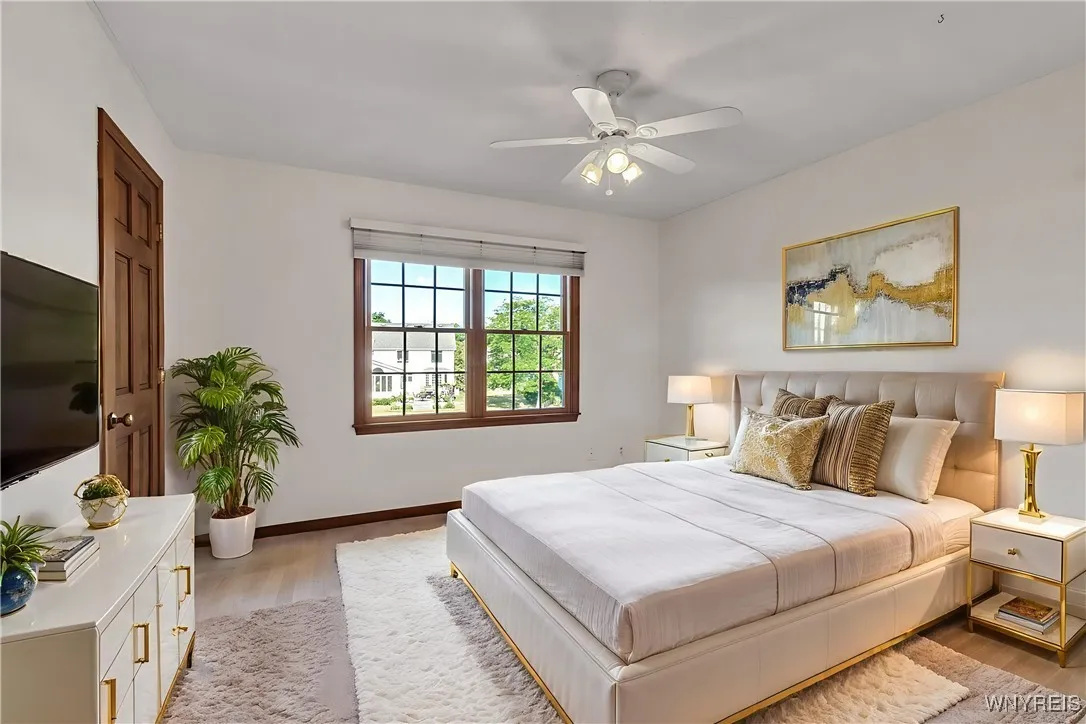 Bedroom 4 is staged with furnishings for visual perspective only