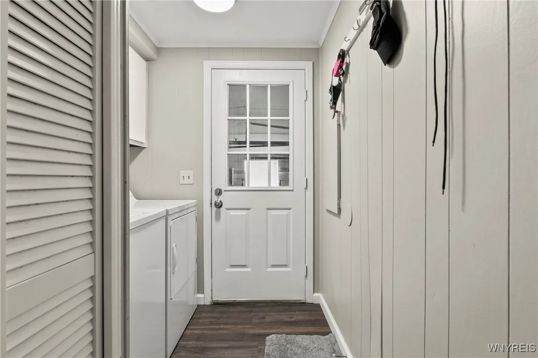 Laundry Room Leading out to Attached Garage - Washer & Dryer are 7 years old)