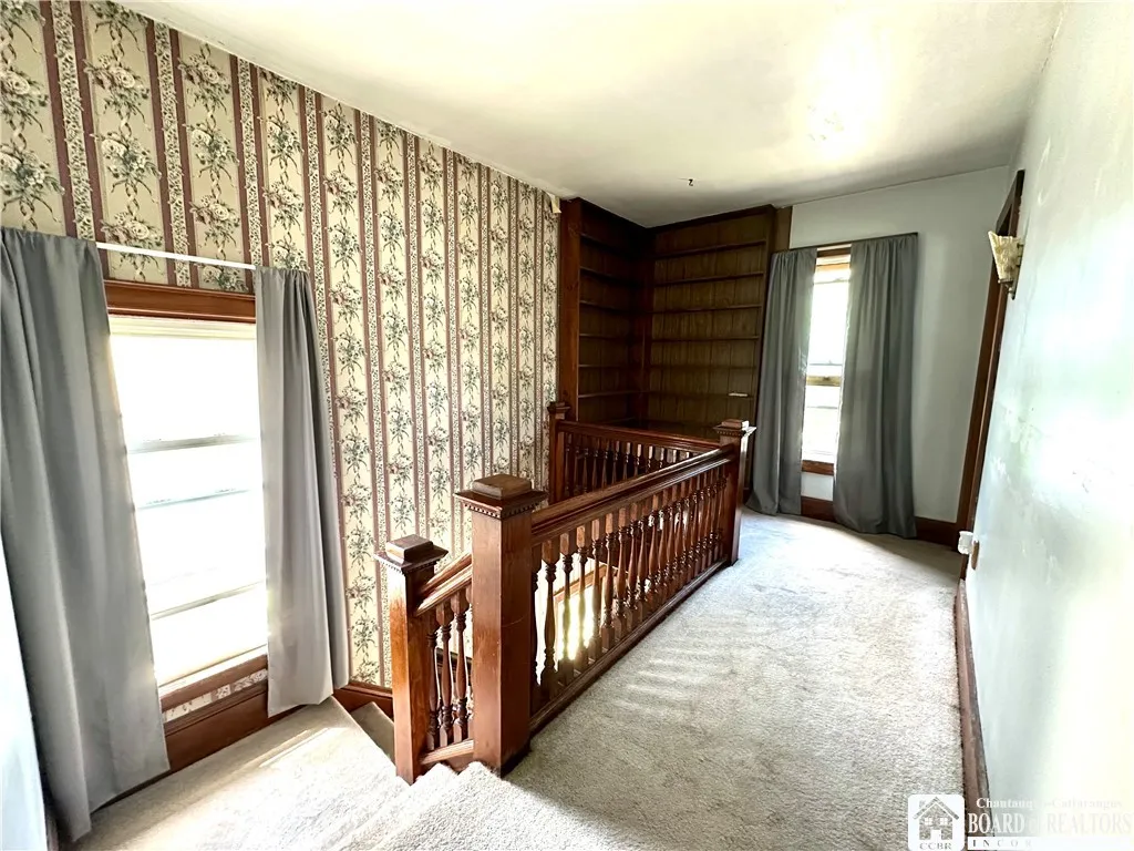 Upstairs from the front stairs - there is another set of stairs off the kitchen area