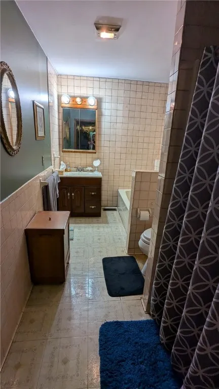 Large bathroom has soaking tub, separate walk in shower
