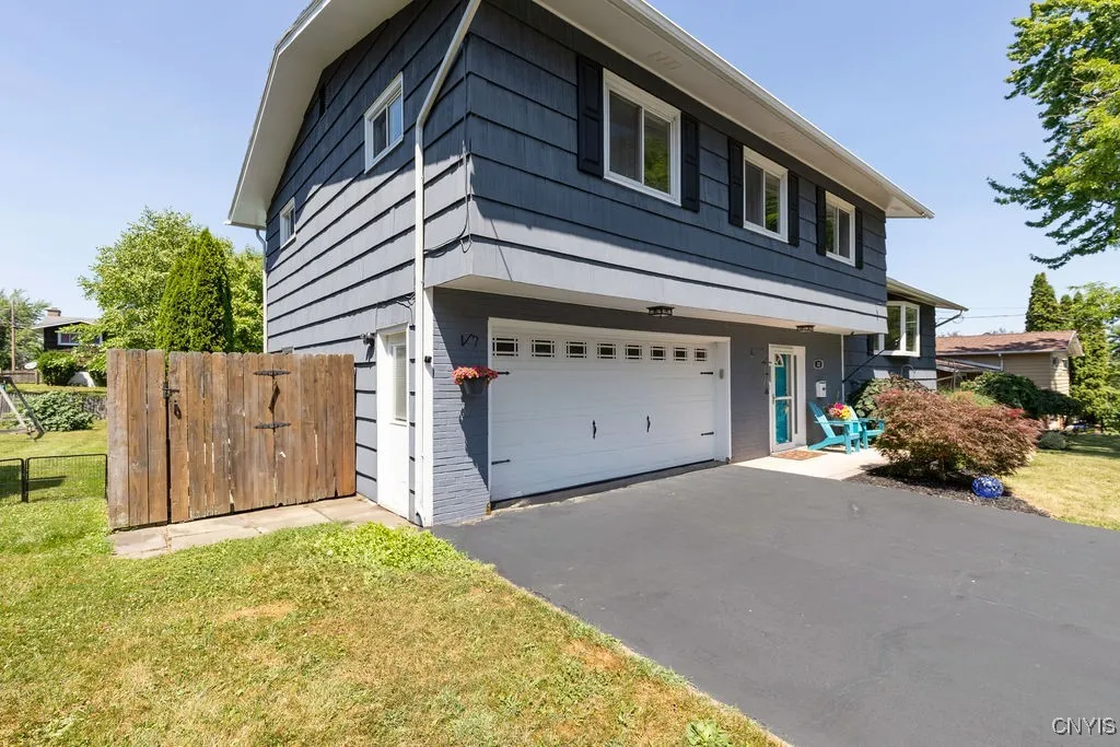 There are gates to the back yard on each side of the house.  The back yard is fully fenced.