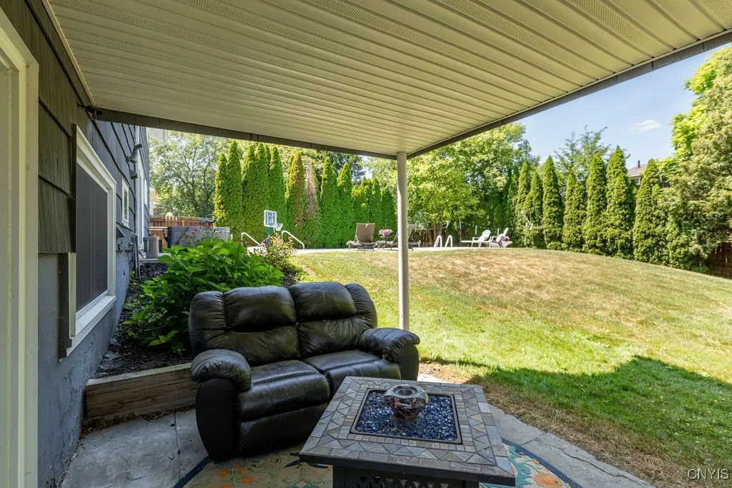 This covered spot is perfect for getting outside without being in direct sunlight.  This is also a good spot to let the pets in and out of the house.