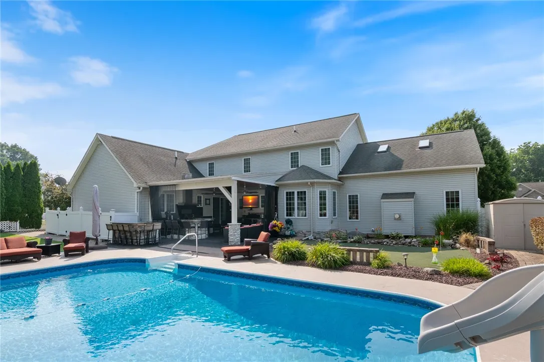 The 18x36 pool with aqua bot pool cleaner and the OUTDOOR kitchen area