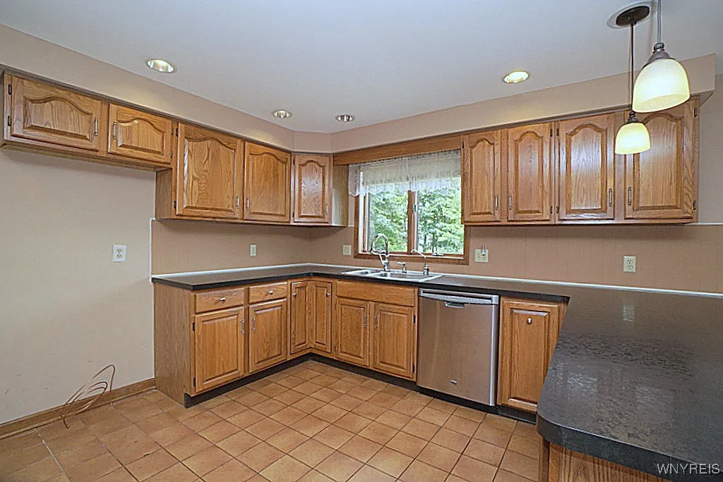 Open kitchen with lots of cupboards and counter space