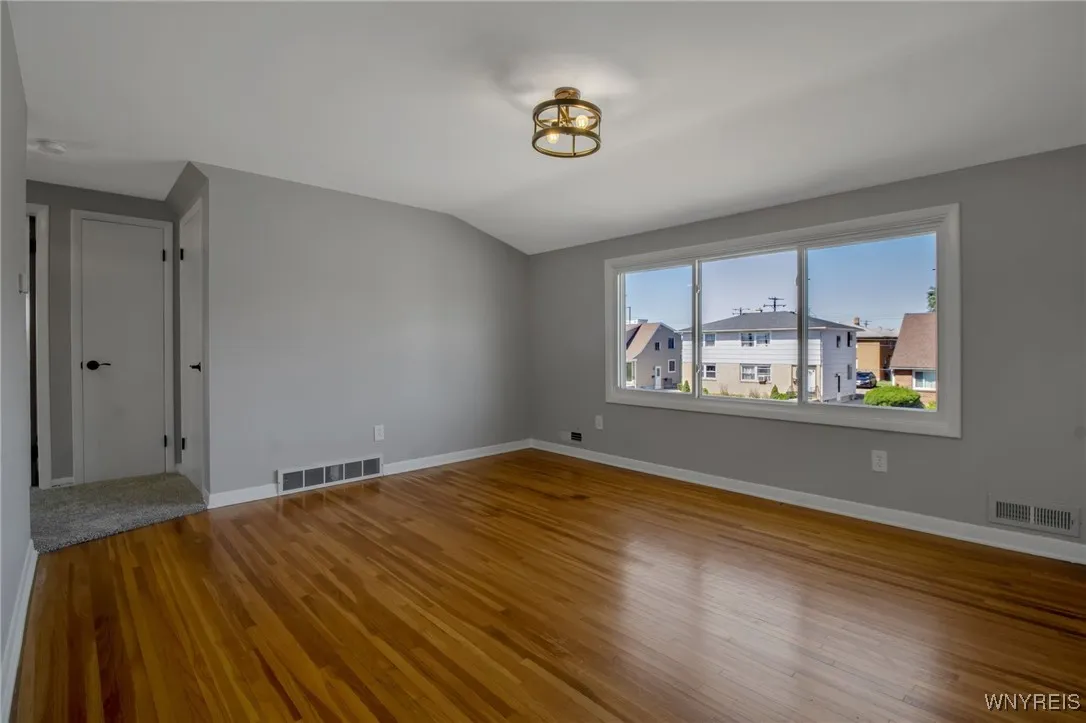 Bonus room on 2nd floor could be an office, den, exercise room, studio. Beautiful HW and lg picture window