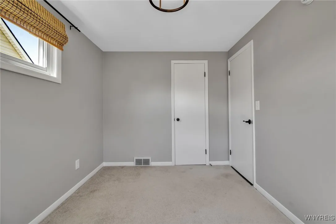 Bedrm 1 on 1st fl. Other view.