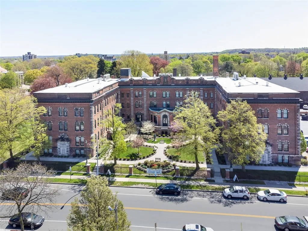 Drone view of exterior looking east across Alexander Street
