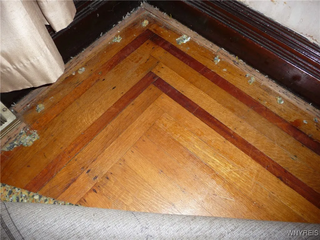 custom hardwood floor under living room carpet