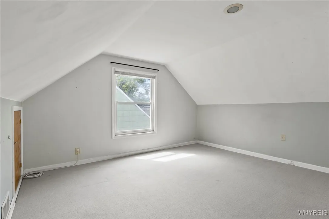 Upstairs primary bedroom plus half bath