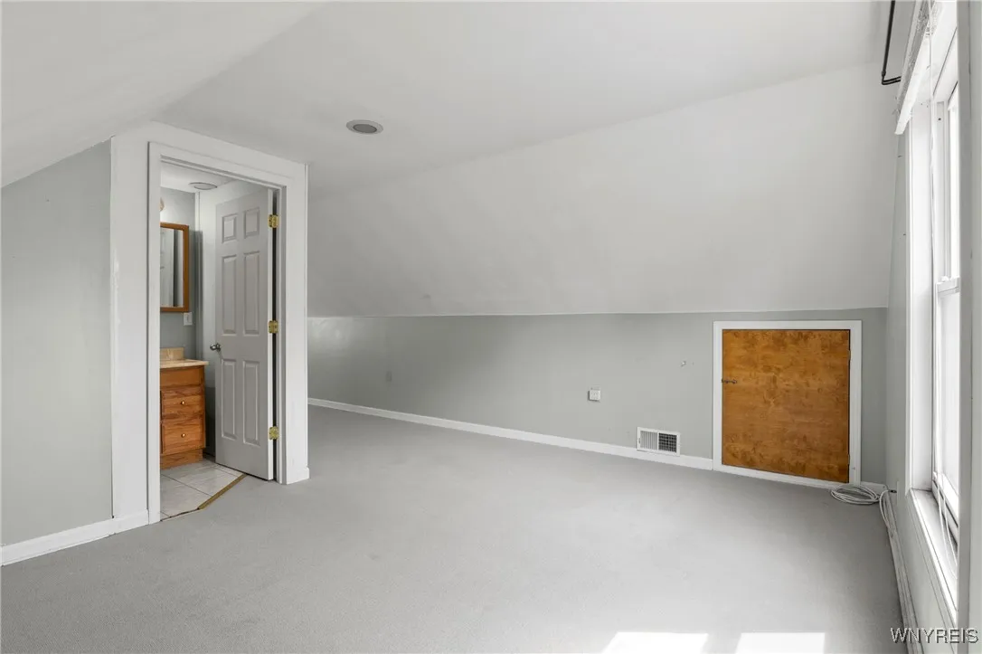 Upstairs primary bedroom plus half bath