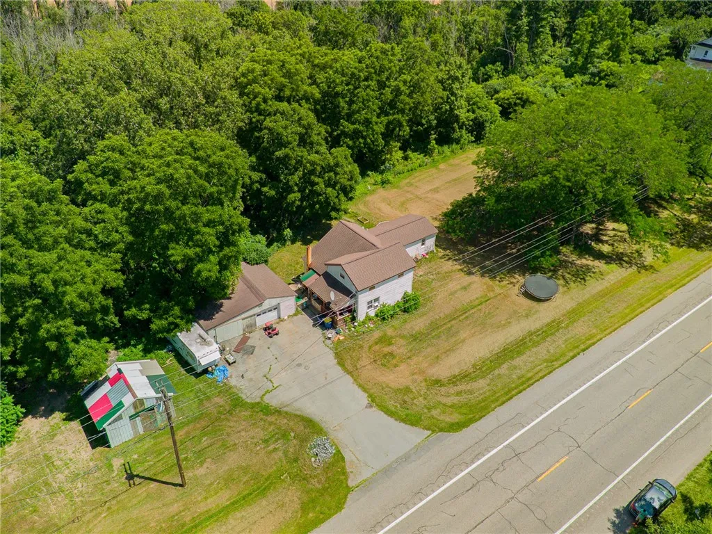 The house (with a great addition!) the shed AND the detached garage