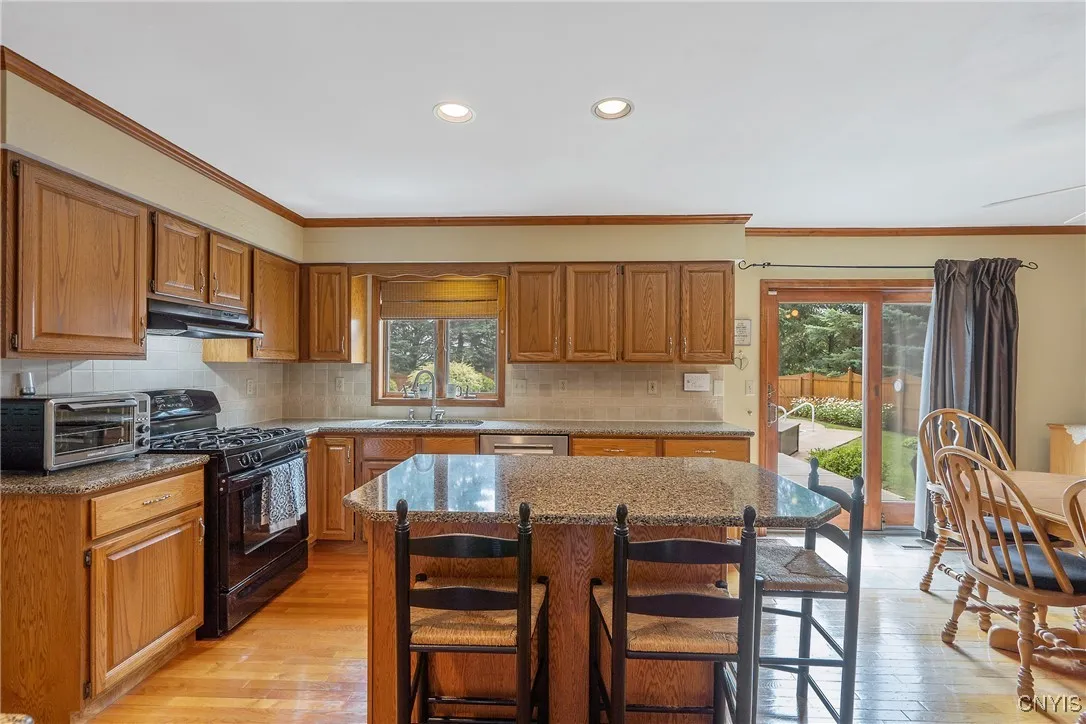 Kitchen, dining and family room open to pool area