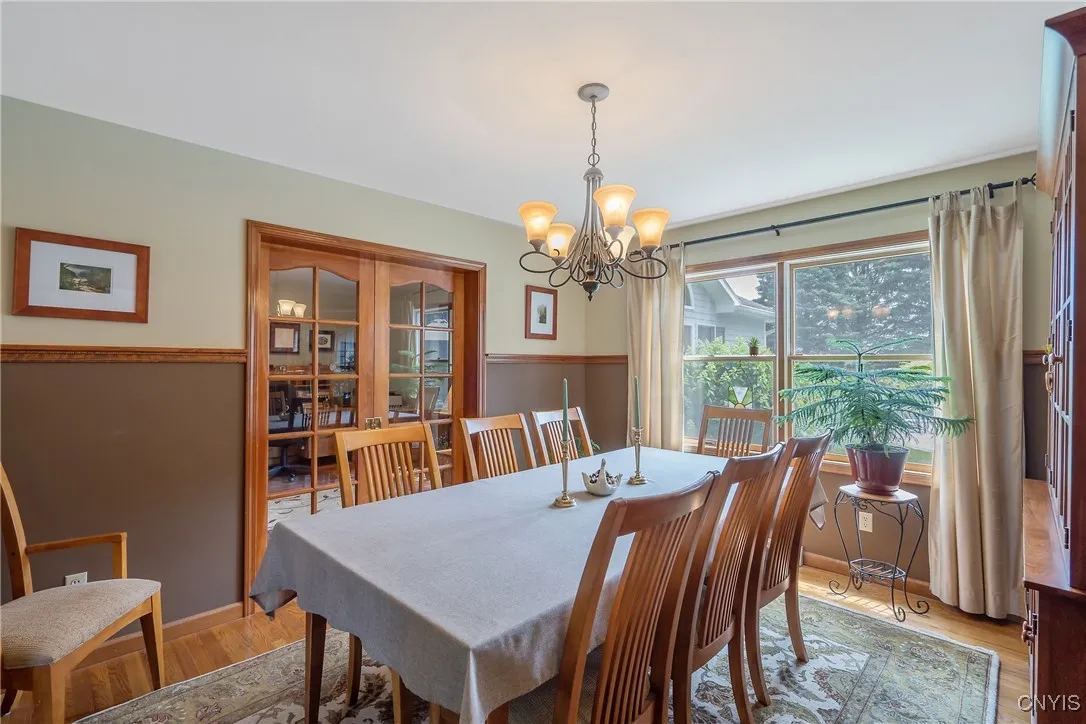 Formal dining room. Primary office and bedroom is beyond the French doors
