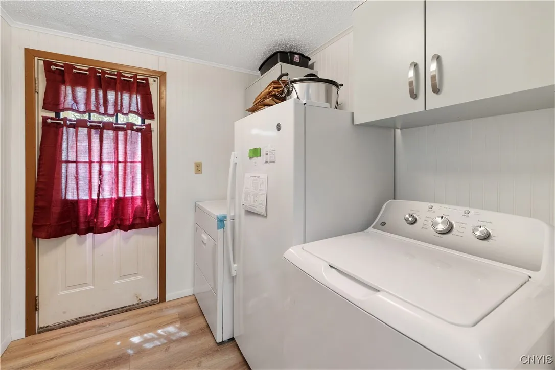 Laundry Room off the primary bedroom/ full bathroom
