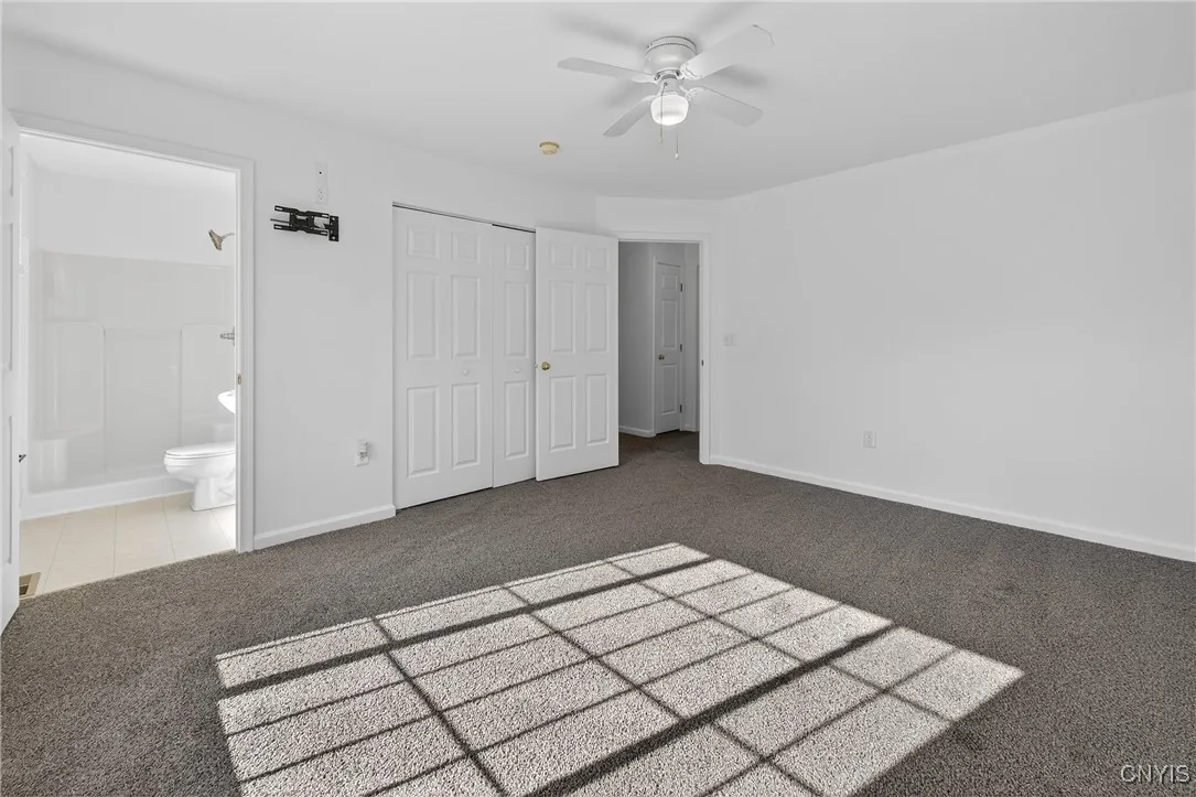 Primary bedroom with bath/closet