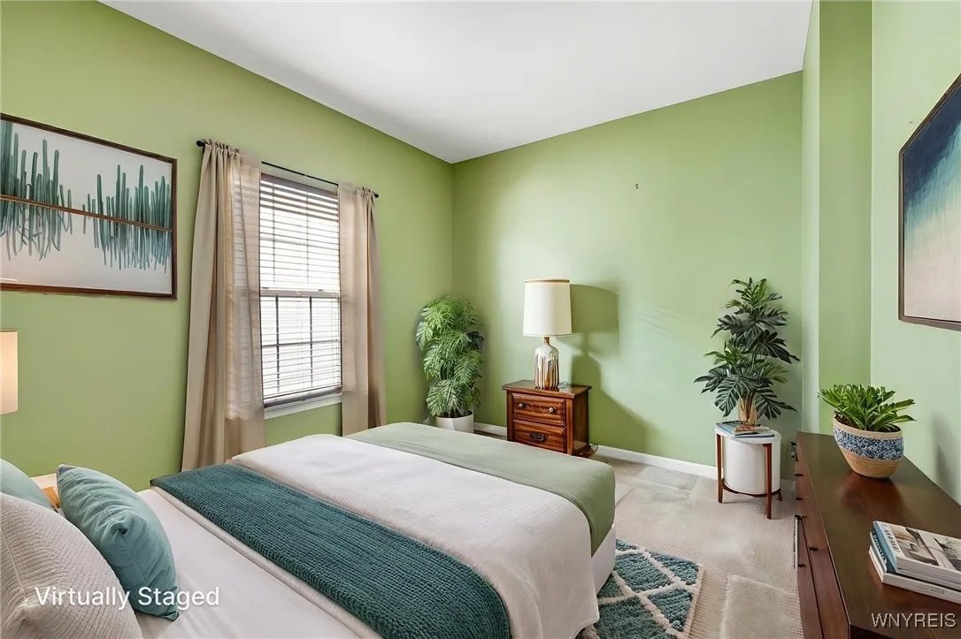 Side Bedroom near the front ( Off the foyer there is a small hallway that leads to 2 bedrooms and full bath).