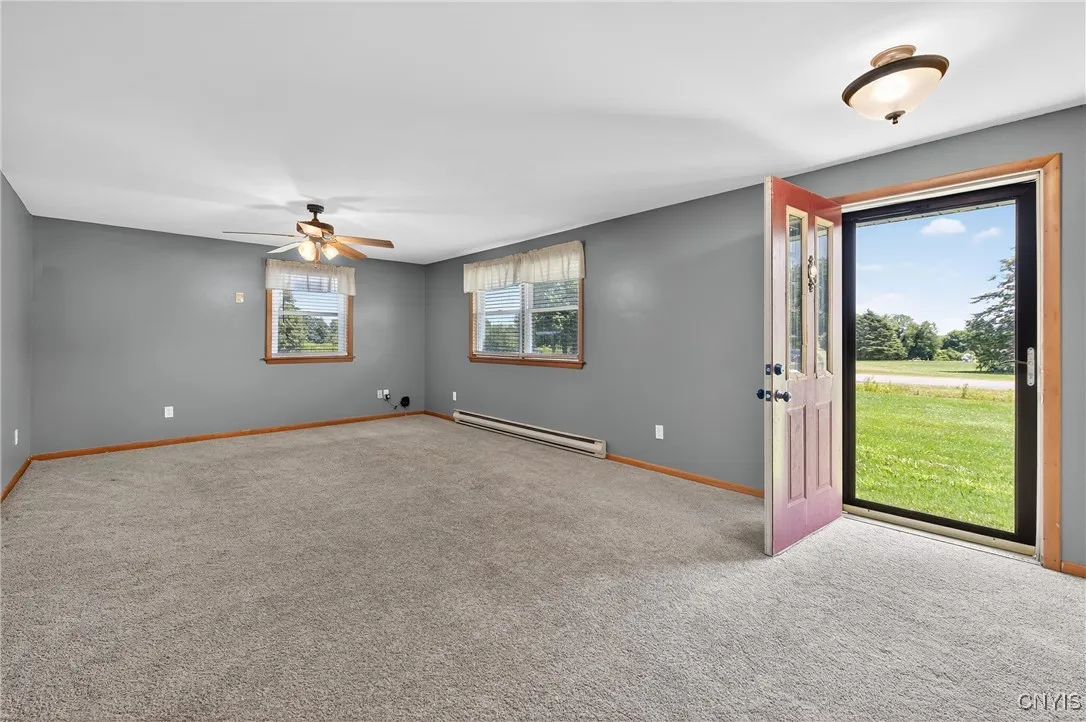 Greet your guests at the front door and step into an oversized living room.