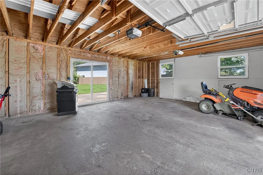 Two car attached garage!  Sliding glass door leads to the patio in the backyard.