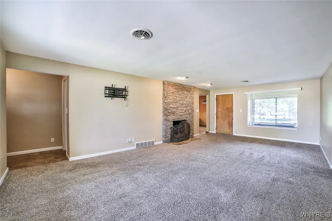 The family room is perfect for TV viewing (TV mount is yours to use)!  And there is room for a dining table too if you like.