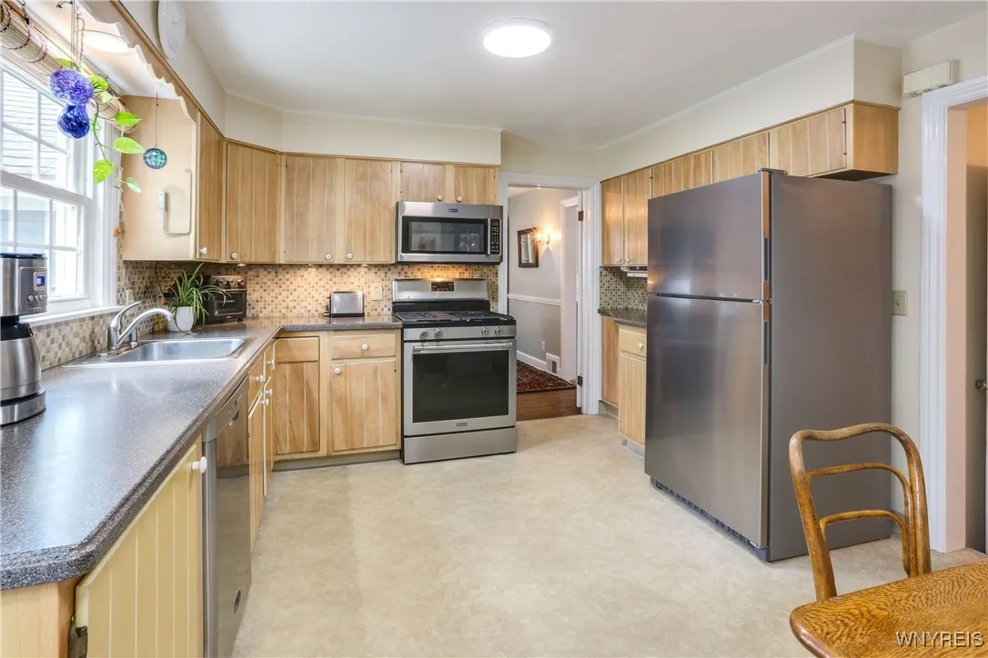 All  appliances will stay in the kitchen. Corian countertops.