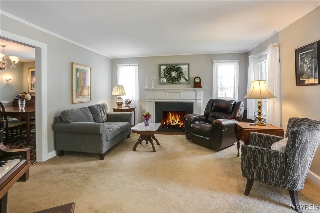 Living Room has gas fireplace and room for a baby grand piano so there is plenty of space.