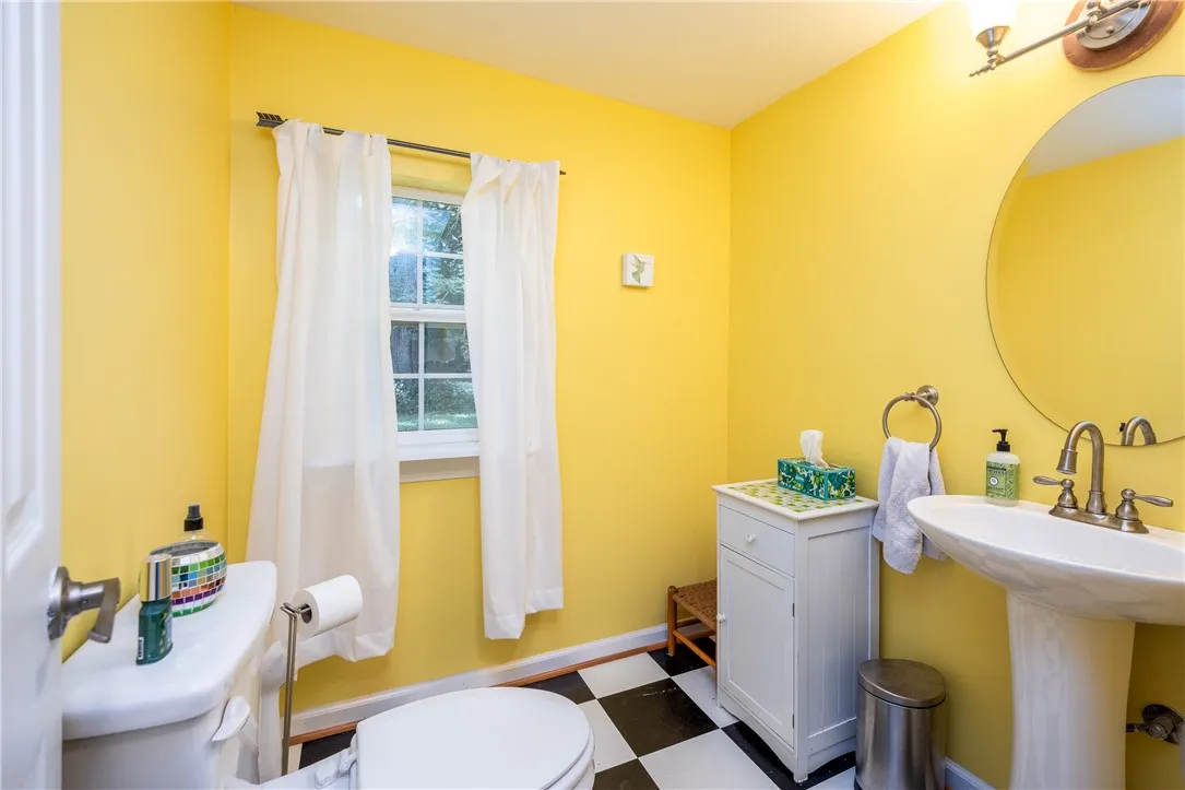1st floor powder room off mudroon entry near kitchen