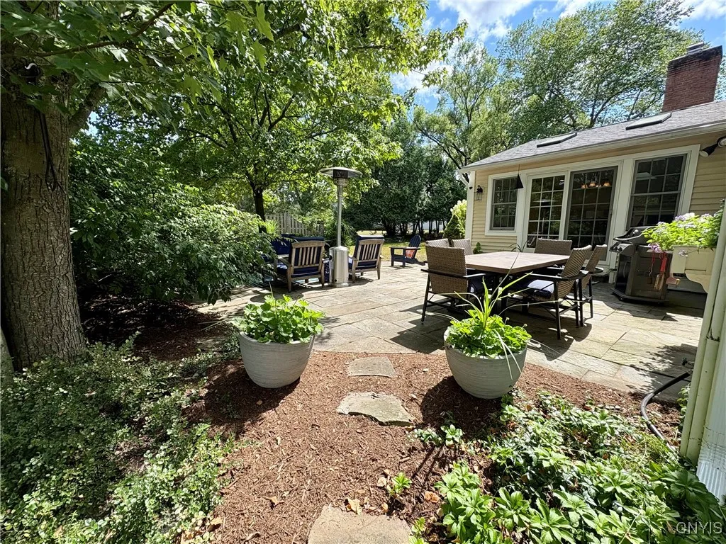 Gorgeous landscaping surrounds the home.