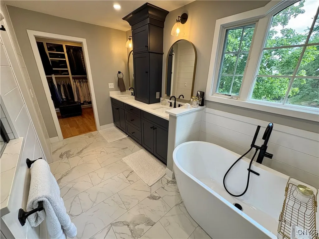 Soaking tub and double sinks.