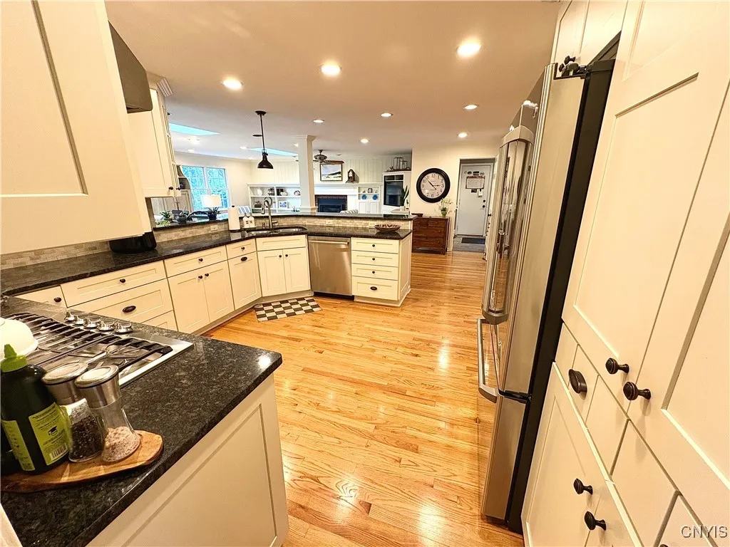 Completely renovated with an open kitchen, family room and dining area.