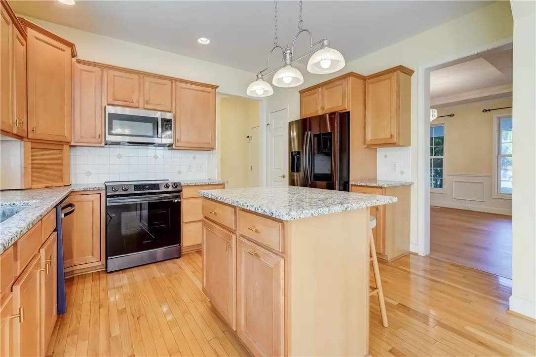 New wifi enabled appliances and large pantry with access to formal dining room