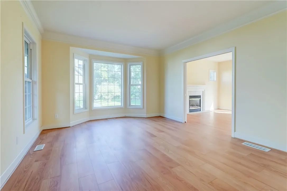 Nicely proportioned living room opens to family room