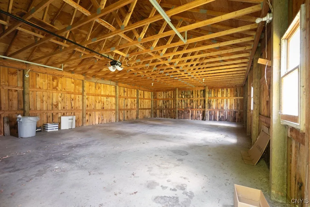 28 X 42 building with access from Abbey Road. Can hold up to six cars, and has electricity.