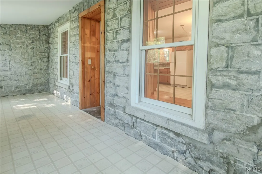 Lovely Stonework on 3 season porch