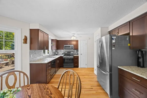 Updated Kitchen with Granite, SS Appliances, and Hardwood Flooring