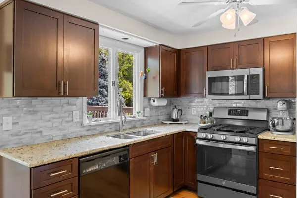 Updated Kitchen with Granite, SS Appliances, and Hardwood Flooring