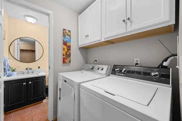 First Floor Laundry Area and Updated Powder Room
