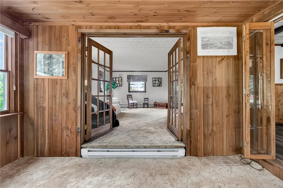 From the enclosed porch there is access to the formal dining room