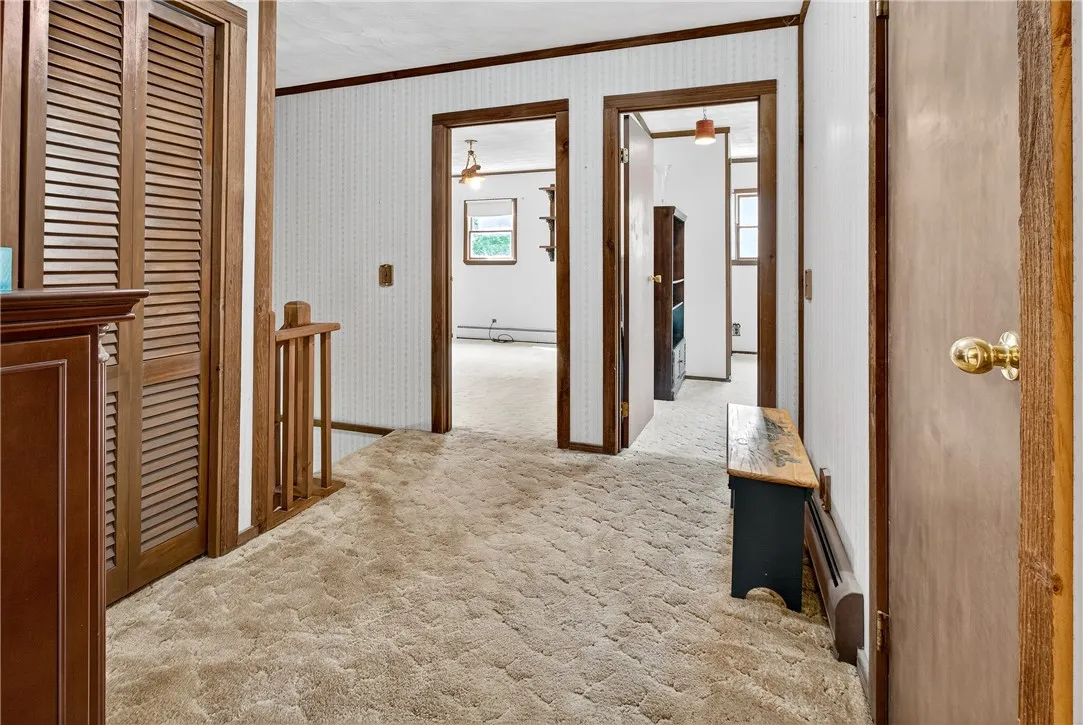The upstairs hallway to the bedrooms comes with a bonus closet