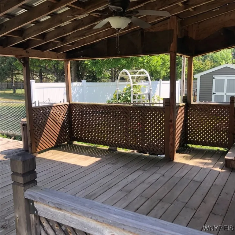 Covered Deck Behind Workshop and Garage
