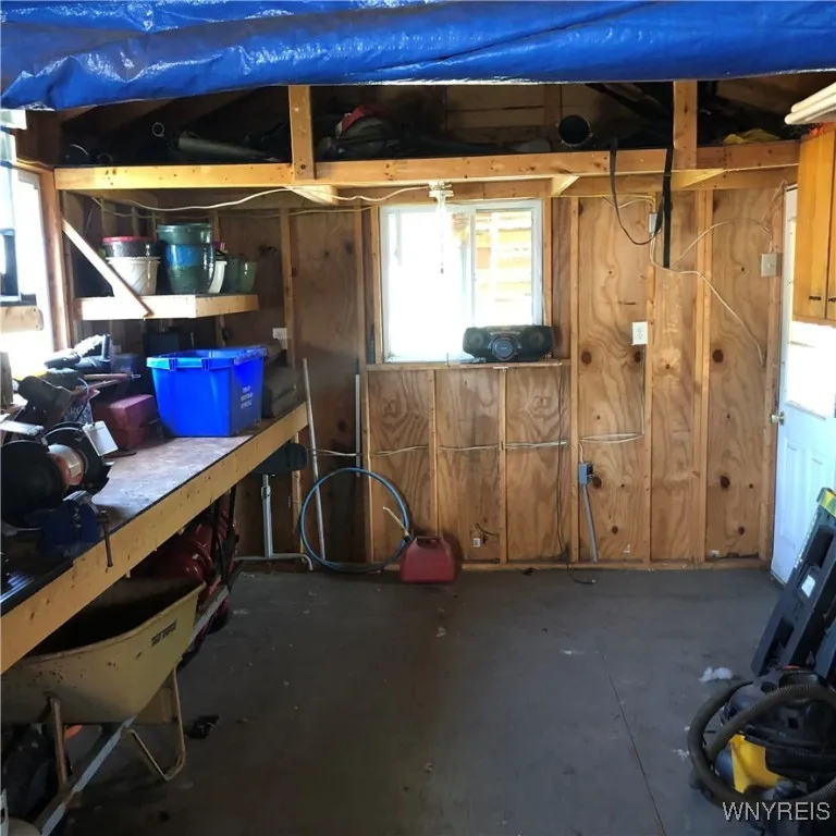 Workshop area behind garage