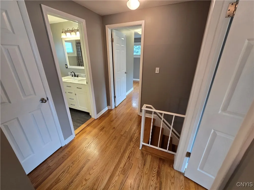 Second floor - linen closet, bathroom, master suite, and stairs