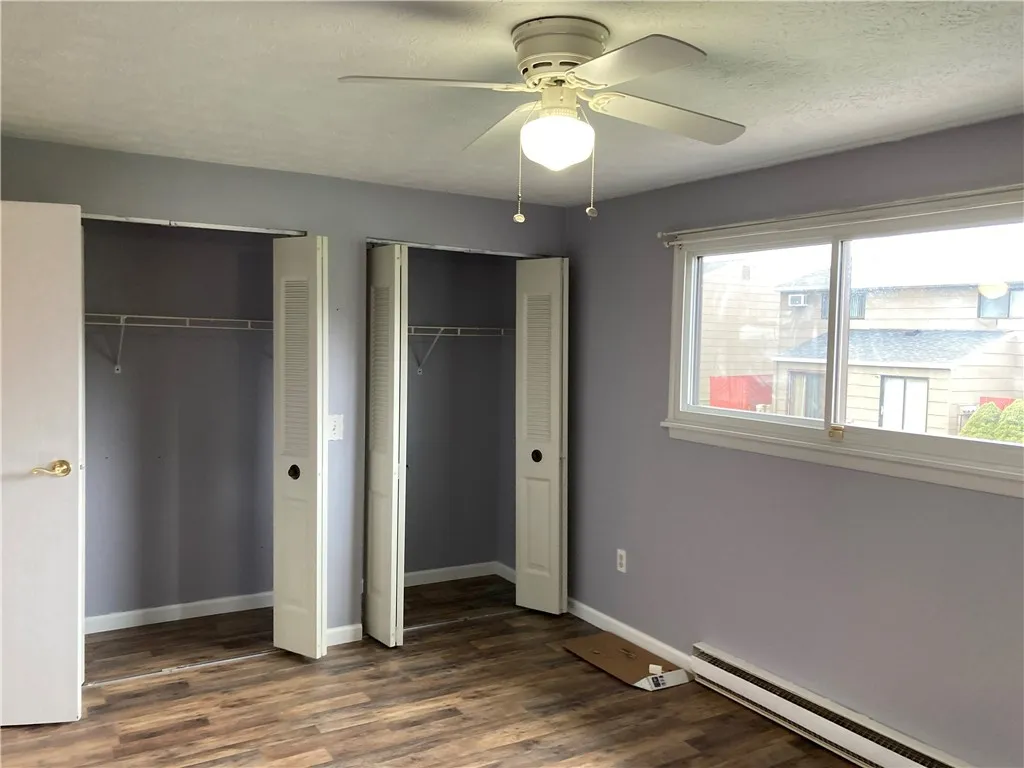 
Rear primary bedroom with two large closets.